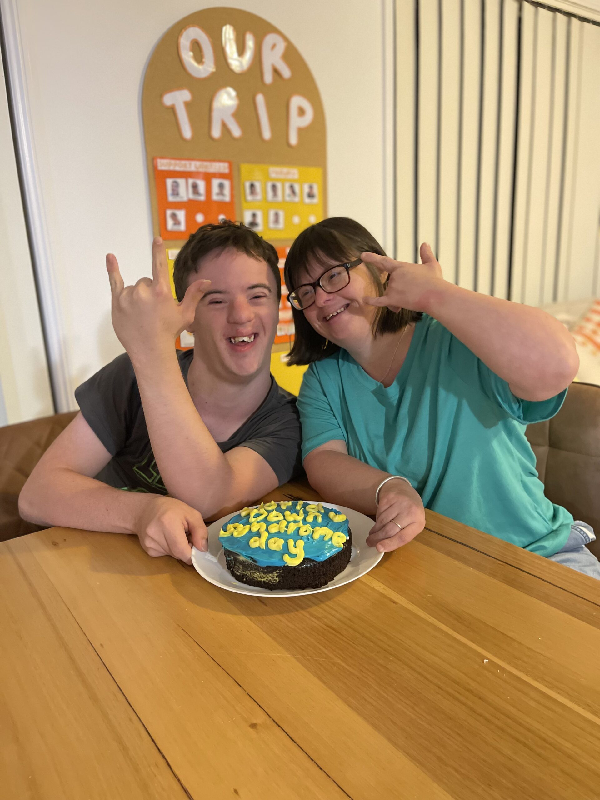 Two participants celebrating together at the table